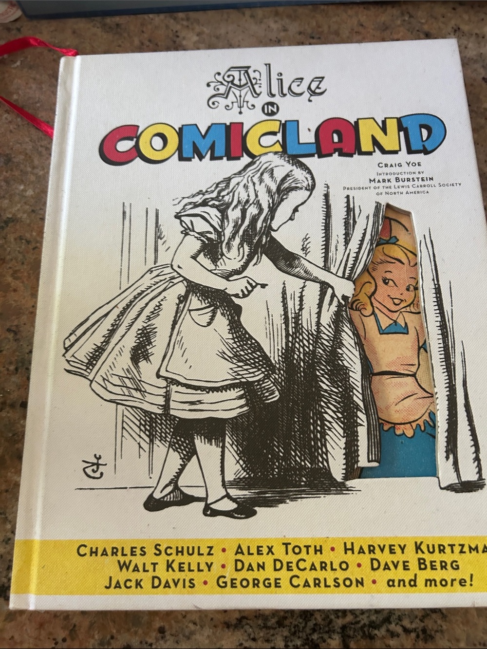 Alice in Comicland Hardcover Book - White, Yellow, Blue, Red